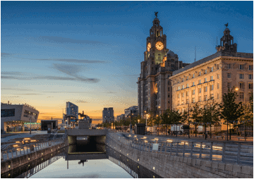 sunset behind the Royal Liver Building in Liverpool, England